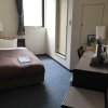 Отель Asahikawa Business Hotel, фото 3