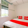 Отель OYO 550 Happyland Guesthouse, фото 7