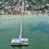 Отель NEW Bay Dreamin 4 Bedroom Private Pool Spa Beach Front Property 3 Home by RedAwning, фото 25