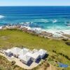 Отель Saltwater - Absolute Oceanfront, Hot Tubs, Sauna, Fire Pits, фото 1
