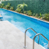 Отель Elegant Stylish 2BR Apartment Aldea Zama Swimming Pool Jacuzzi Terrace, фото 13