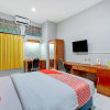 Отель OYO 90089 Hotel Satria Syariah, фото 12