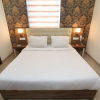 Отель OYO 8277 Tricity Relax Inn, фото 25