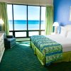 Отель Landmark Holiday Beach Resort by VRI Americas, фото 12