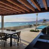 Отель Beachfront Luxury Condo Pool Jacuzzi, фото 14