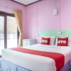 Отель OYO 797 Pink House Bungalow, фото 3