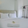 Отель Spacious and Comfortable 2BR Green Bay Pluit Apartment, фото 1