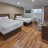 Отель Extended Suites Tijuana Macroplaza, фото 6