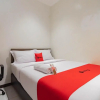 Отель RedDoorz Plus @ Pakuan Residence Tajur, фото 13