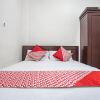 Отель OYO 93477 Almahyra Guest House Syariah, фото 6