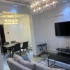 Отель Captivating 3-bed Apartment in Ikeja, фото 12