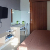 Отель Redliving Apartemen Grand Kamala Lagoon Pekayon Tower Barclay North, фото 5