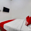 Отель Super OYO 91173 Guesthouse King Puntodewo, фото 7