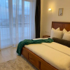 Отель Karim house, 2 bedroom apartment with king beds, balcony view and workspace in Kilimani Nairobi, фото 18