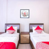 Отель OYO 1118 Artomoro Family Guesthouse, фото 3