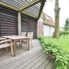 Отель Modern Holiday Home in Kollumerland C.A with Private Garden, фото 7