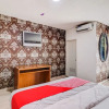 Отель OYO 90873 Orchid Guesthouse, фото 21