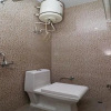 Отель OYO 11593 Hotel Aman Guest House, фото 9