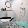 Отель Fancy And Nice 1Br With Extra Room At Amartha View Apartment, фото 11