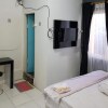 Отель KoolKost near Sepinggan Airport Balikpapan, фото 6