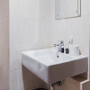 Отель Homey And Simply Look 1Br Tamansari Bintaro Mansion Apartment, фото 11