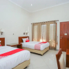 Отель Oyo 1430 Hotel Ratna Syariah, фото 3