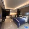 Отель Zhuyu Holiday Apartment (Haikou International Trade Friendship Sunshine City Branch), фото 5