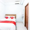 Отель OYO 1516 Cemara Gading, фото 7