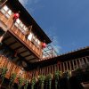 Отель Lijiang Xin Gui Zhu Boutique Inn, фото 1
