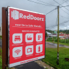 Отель RedDoorz near De La Salle Manado, фото 1