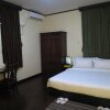 Отель Garden Home Bed and Breakfast в Янгоне