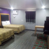 Отель Coachman's Inn & Suites, фото 3