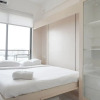 Отель Warm And Cozy Stay Studio At Sky House Bsd Apartment, фото 2