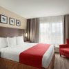 Отель Country Inn & Suites by Radisson, Omaha Airport, IA в Картер-Лейке