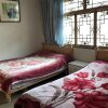Отель Songpan Yi Xin Yuan Hostel, фото 3