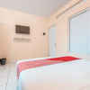 Отель Super OYO 1868 J&b Room Pramuka, фото 7