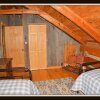Отель Logged Inn - 3 Br cabin by RedAwning, фото 24