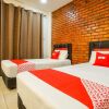 Отель OYO 90178 Classic Homestay, фото 5