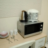Отель Strategic Studio Apartment At Aeropolis Residence Near Airport, фото 6