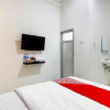 Отель OYO 91026 Kasmarani Residence Syariah, фото 4