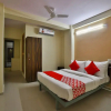 Отель OYO Flagship 27974 Madhuram Arcade, фото 7