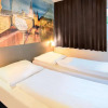 Отель B&B HOTEL Würzburg-City, фото 6