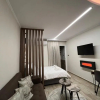 Отель Cozy Downtown Apartment, фото 4