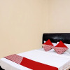 Отель OYO 92553 Caitlin Homestay, фото 6