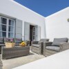 Отель Mykonos Psarrou villa for 18 persons by VillaRentalsgr в Остров Миконос