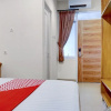 Отель OYO 90629 The Home Srengseng, фото 17
