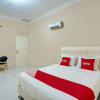 Отель OYO 93033 Mutiara Homestay Syariah, фото 5