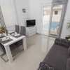 Отель Comfortable apartment in a quiet area, private terrace, shared swimming pool, фото 2