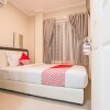 Отель OYO 387 Alfa Guest House, фото 4