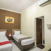Отель NIDA Rooms Selokan Mataram Depok, фото 5